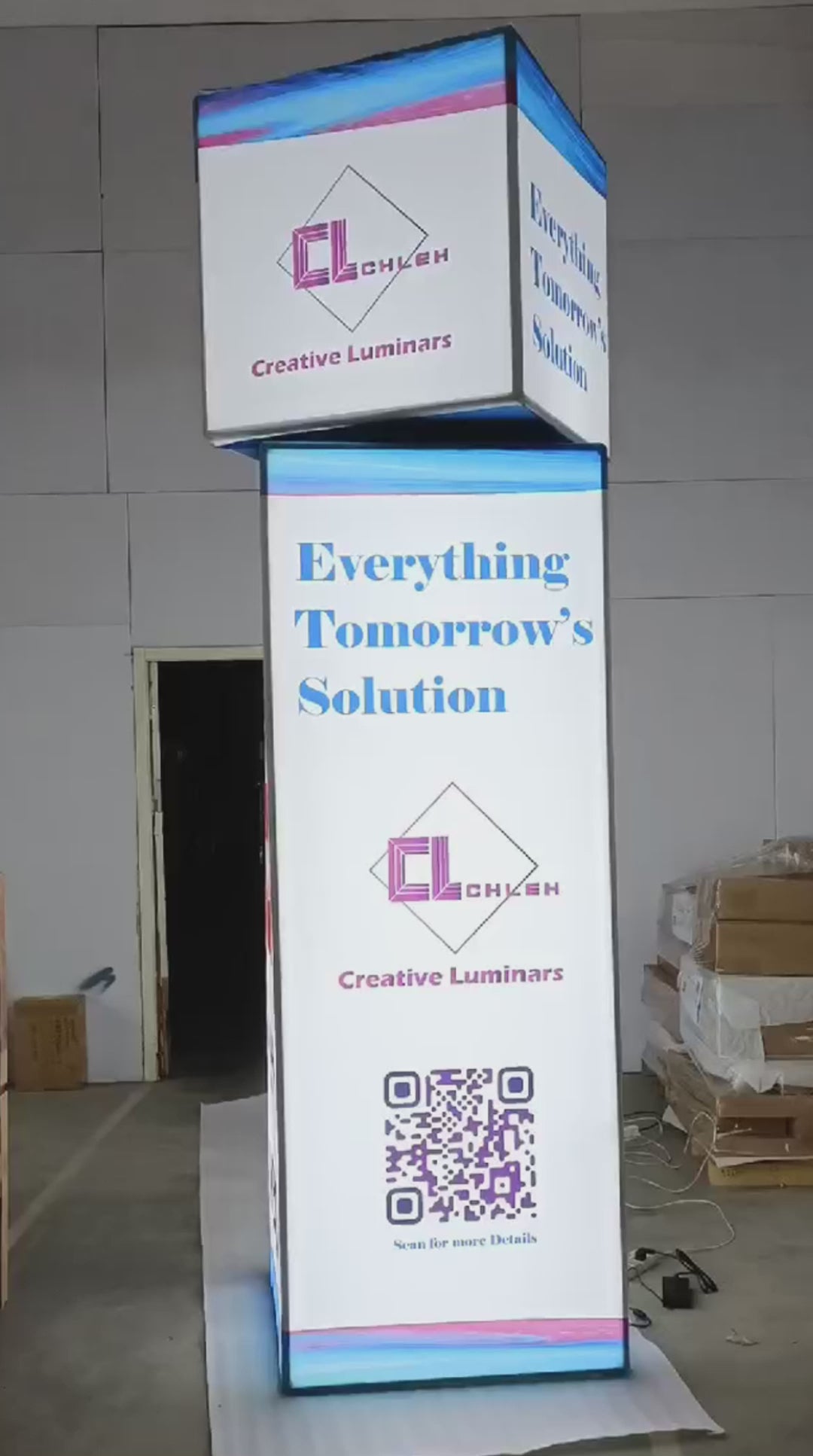 Rotating backlit display tower stand with modern design, ideal for trade show exhibits, measuring 200×220×1380mmH.